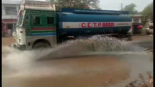 Baddi siverage water flowing like a river in Bhud on Baddi Nalagarh National Road 105