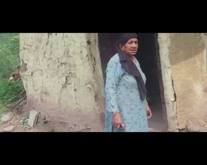 Old helpless widow woman in district Solan, forced to live alone in a broken house